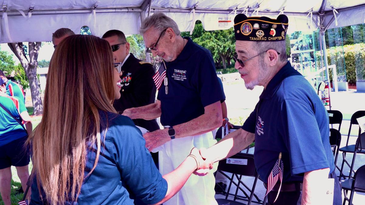 Congresswoman Sheila Cherfilus-McCormick and a veteran